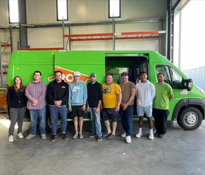 Group of Servpro employees in front of van