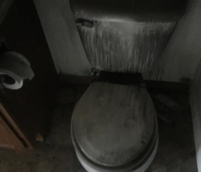 Toilet covered in black soot in a Fergus Falls home. 